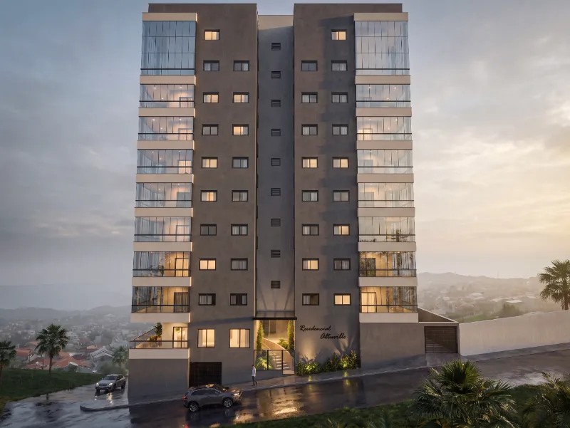 Fachada do Residencial AltaVille vista da rua, torre única de esquina com as varandas de vidro iluminadas